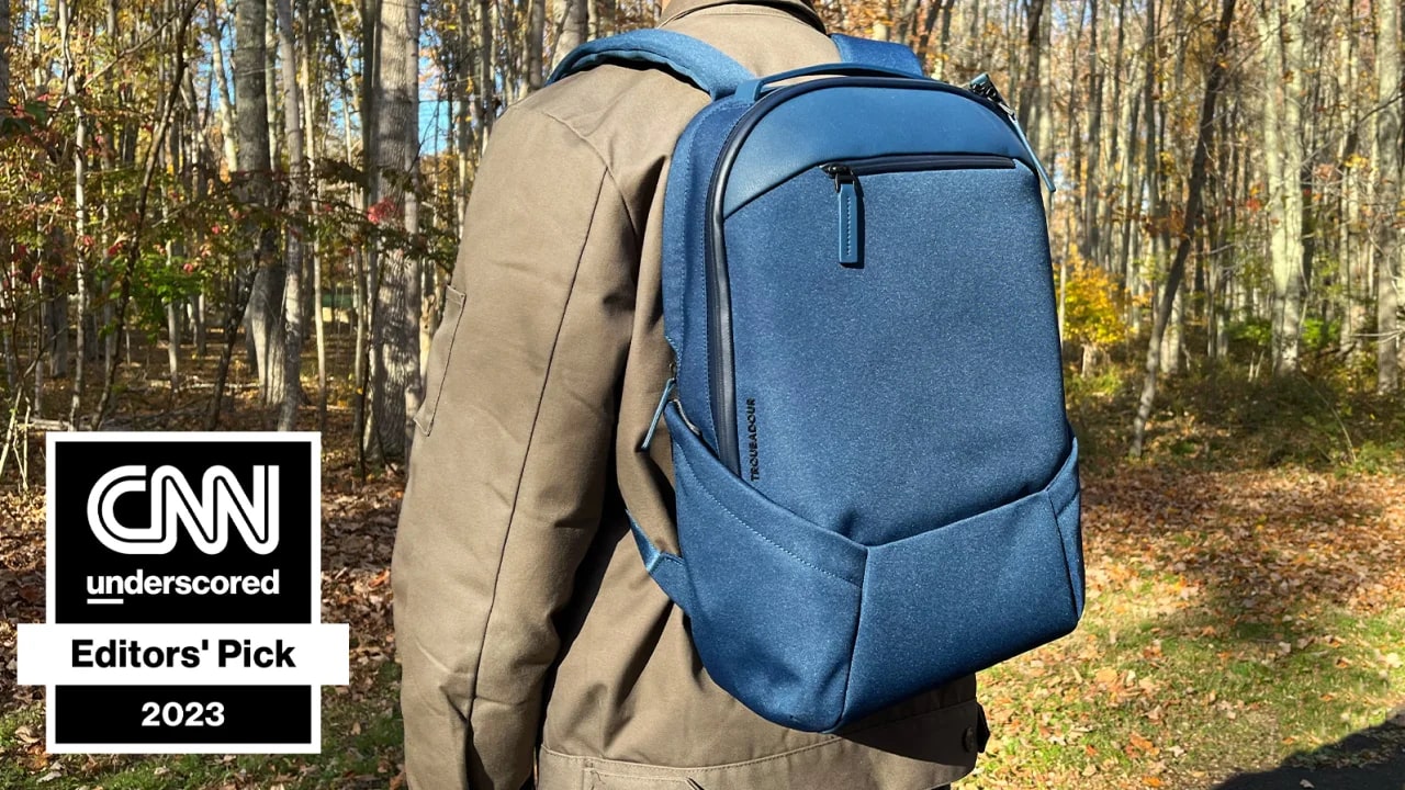 Person wearing a blue backpack